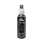 a black bottle of hair toner